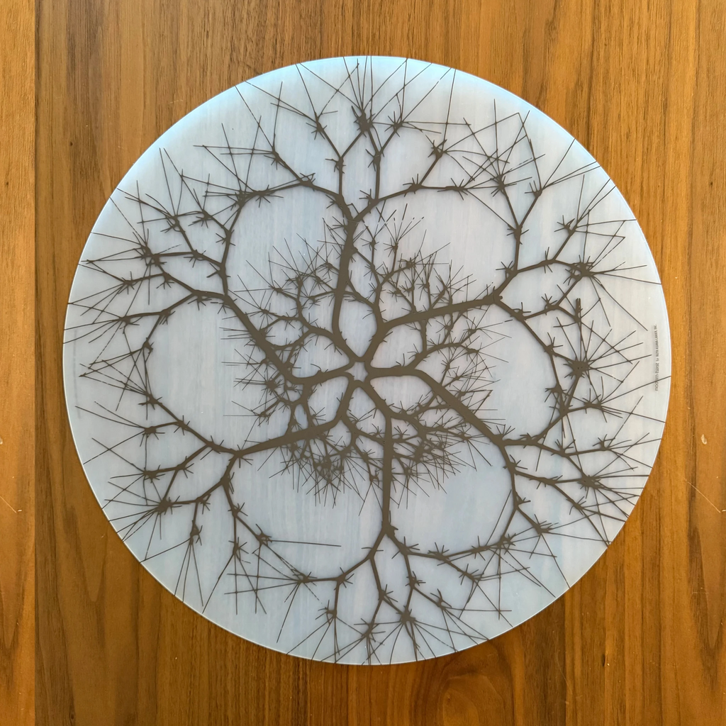 Made from 100% food grade, plastic-free silicone & inspired by Ruth Asawa’s (American modernist artist) abstract looped-wire designs, the hand silk-screened modern-twist Placemat brings natural beauty to your table with its soft, beautifully translucent pattern that enhances any surface while keeping lead, latex, phthalates, BPAs, & other harsh chemicals far away from your food. 