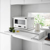Reclaim the precious countertop space your kitchen appliances are hogging with this double two-way drawer. Place larger kitchen items on top and enjoy two extras drawers for utensils, dish towels, pot holders, tea trinkets—you name it!

Both sides feature vanishing pull-out shelves, providing ample space to perch a mug while you perfect your morning beverage, or rest that bowl of microwaved leftovers so you can season it up before carrying it to the table.