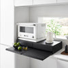 Both sides feature vanishing pull-out shelves, providing ample space to perch a mug while you perfect your morning beverage, or rest that bowl of microwaved leftovers so you can season it up before carrying it to the table.