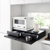 Reclaim the precious countertop space your kitchen appliances are hogging with this double two-way drawer. Place larger kitchen items on top and enjoy two extras drawers for utensils, dish towels, pot holders, tea trinkets—you name it!

Both sides feature vanishing pull-out shelves, providing ample space to perch a mug while you perfect your morning beverage, or rest that bowl of microwaved leftovers so you can season it up before carrying it to the table.
