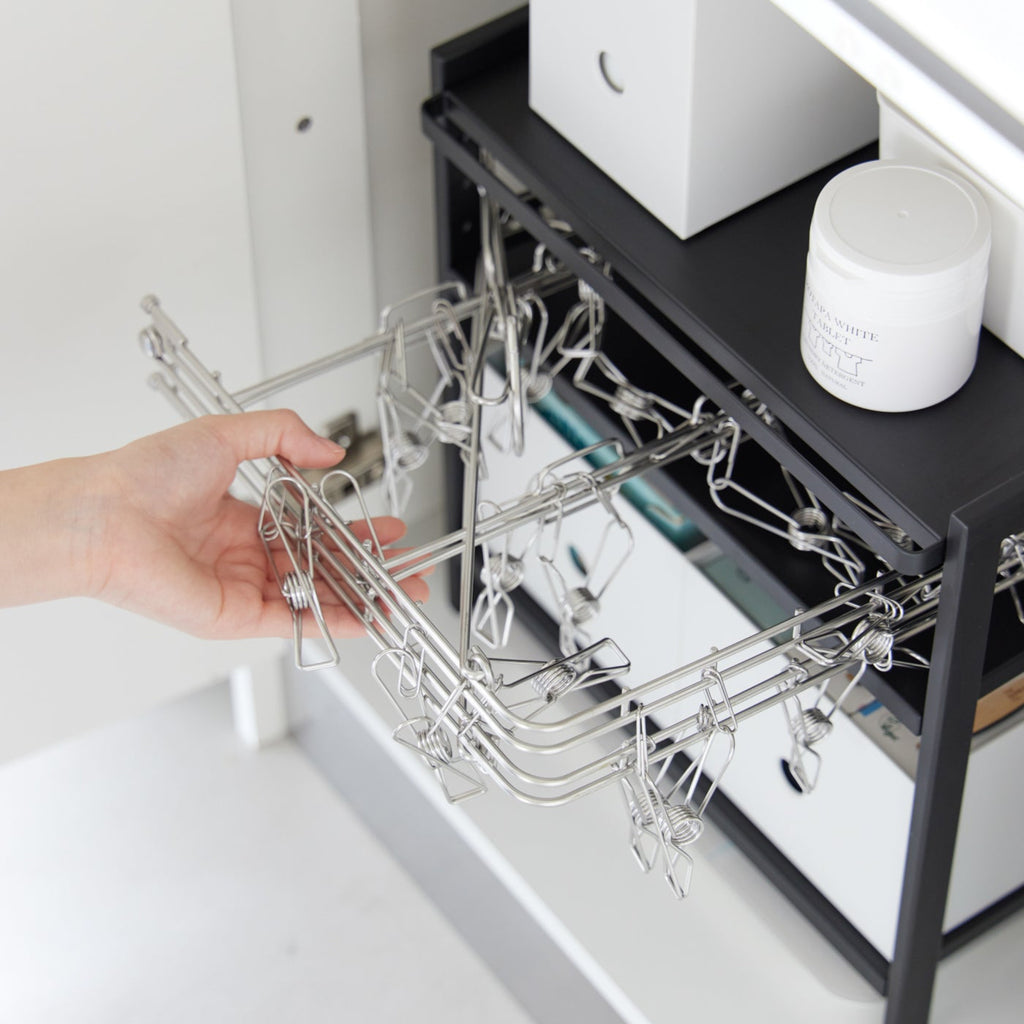 This three-tier steel kitchen storage rack is your helpful aid for cabinet organization! Adjust the bottom two shelves as you wish to store baking sheets, electric burners, pots and pans, and other bulky kitchen appliances that are otherwise hard to store. An effective solution to keep your cleaning tools in check under the kitchen sink, and even bathroom cabinets.
