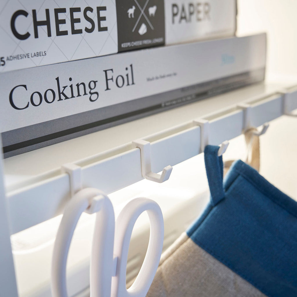 This kitchen appliance storage rack creates a dedicated space in the kitchen for your mid-sized appliances such as toaster ovens, microwaves, and blenders. The bottom compartment accommodates small refrigerators and garbage cans.