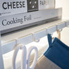This kitchen appliance storage rack creates a dedicated space in the kitchen for your mid-sized appliances such as toaster ovens, microwaves, and blenders. The bottom compartment accommodates small refrigerators and garbage cans.