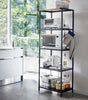 This kitchen appliance storage rack creates a dedicated space in the kitchen for your mid-sized appliances such as toaster ovens, microwaves, and blenders. The bottom compartment accommodates small refrigerators and garbage cans.