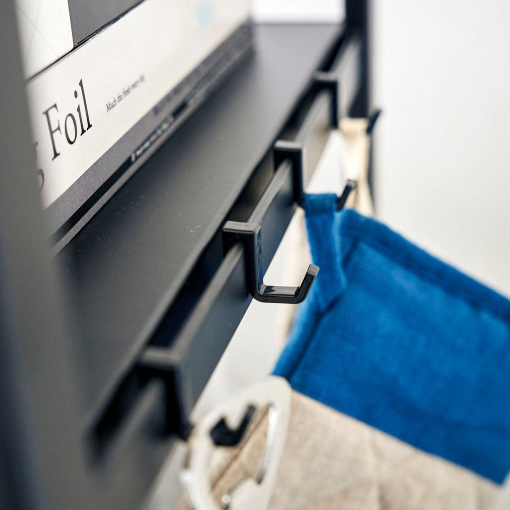 This kitchen appliance storage rack creates a dedicated space in the kitchen for your mid-sized appliances such as toaster ovens, microwaves, and blenders. The bottom compartment accommodates small refrigerators and garbage cans.
