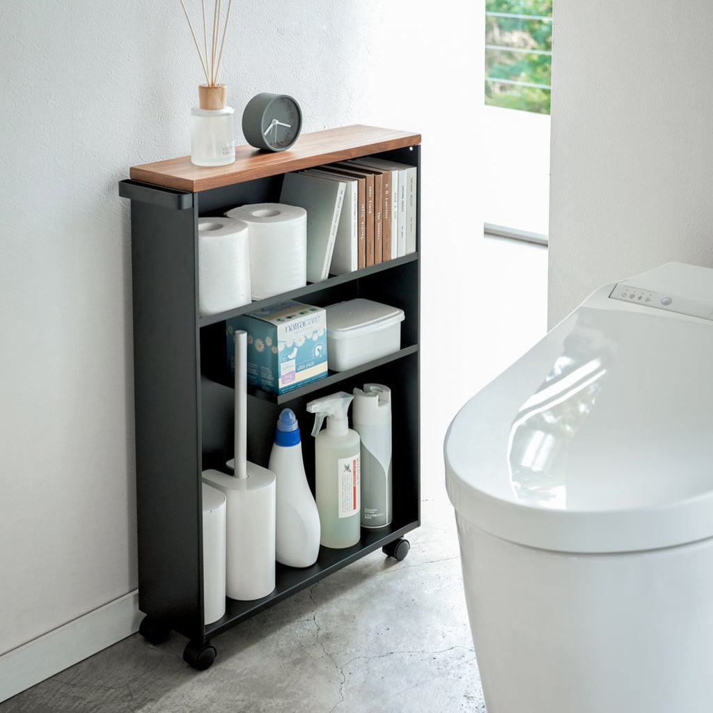 You’ll never run out of bathroom essentials, like toilet paper, cleaners, and other bathroom products with this minimalist, discreet rolling cart. Its slim profile makes this cart perfectly at home facing toward or away from walls, or nestled between tight spaces. 