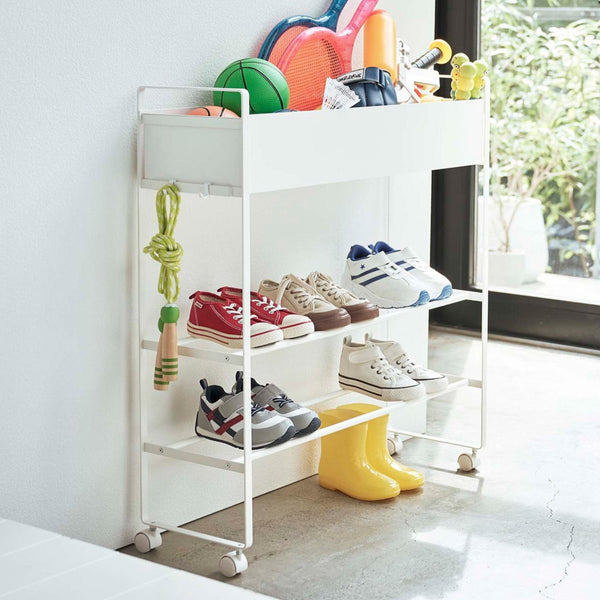 Keep athletic equipment by the door. Storage rack for indoor use. Basket is removable. Two of the wheels can be locked into place to prevent rolling. Holds up to (6) six pairs of shoes.