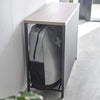 A front panel neatly conceals slippers, outdoor toys, or any other entryway clutter while keeping them within reach, making it the ideal storage solution for frequently-used items. 