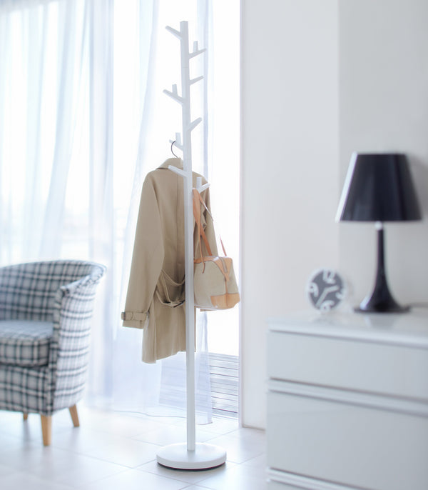 Never drag your coat with this standing coat rack.

Go out on a limb and try this coat rack with rotating branches. While slim and minimalist, it will hold a surprising amount of items. Don’t worry, it won’t wiggle or wobble thanks to its weighted base.