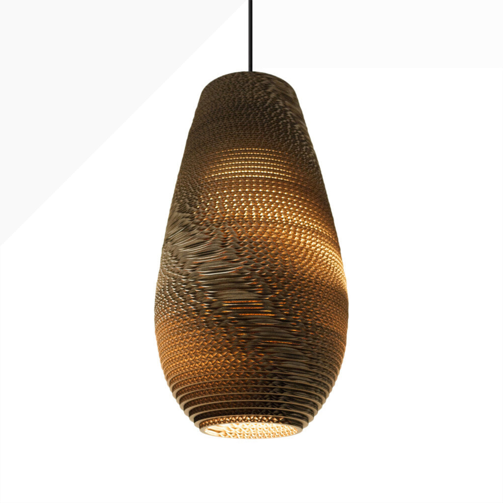 Handcrafted from recycled cardboard, Graypants flagship Scraplights provide warm, intimate, and functional lighting for any occasion or space. Tough and elegant, each is precision cut with a laser and assembled by hand using non-toxic adhesive, and all Scraplights are treated with a non-toxic fire retardant.