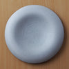 A 26cm plate with beautiful curves and a smooth texture. It envelops and highlights your food. Simply place food in the center for an elegant presentation. The deep recesses make it suitable for serving dishes with lots of liquid. SKU: 154-0041.