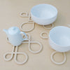 Decorate your table and protect the tablecloth with Inside Out wood trivets by Anne Thomas of TOMA Objects. Made of natural finish birch plywood. (A trivet is an object between a hot pan or serving dish and the table or countertop.) They have great heat resistance and prevent damage to surfaces caused by high heat. 