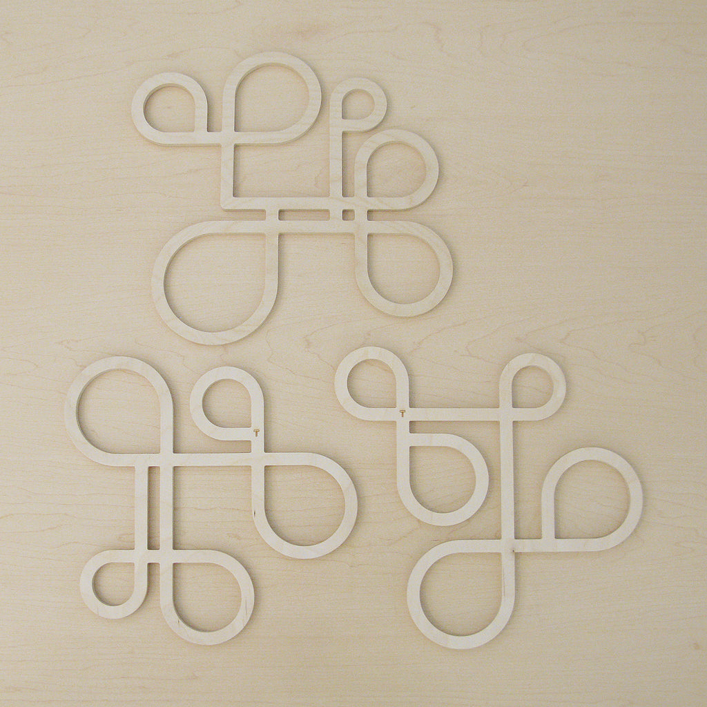 Decorate your table and protect the tablecloth with Inside Out wood trivets by Anne Thomas of TOMA Objects. Made of natural finish birch plywood. (A trivet is an object between a hot pan or serving dish and the table or countertop.) They have great heat resistance and prevent damage to surfaces caused by high heat. 