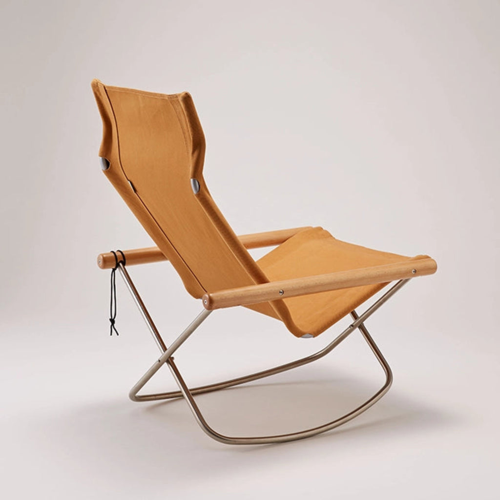 The angles and materials of each seat, armrest, and backrest are carefully crafted to support the body. The fabric adjusts itself to the shape and weight of the user's body, embracing it gently.The soft seat surface and smooth wooden armrests are pleasant to touch.