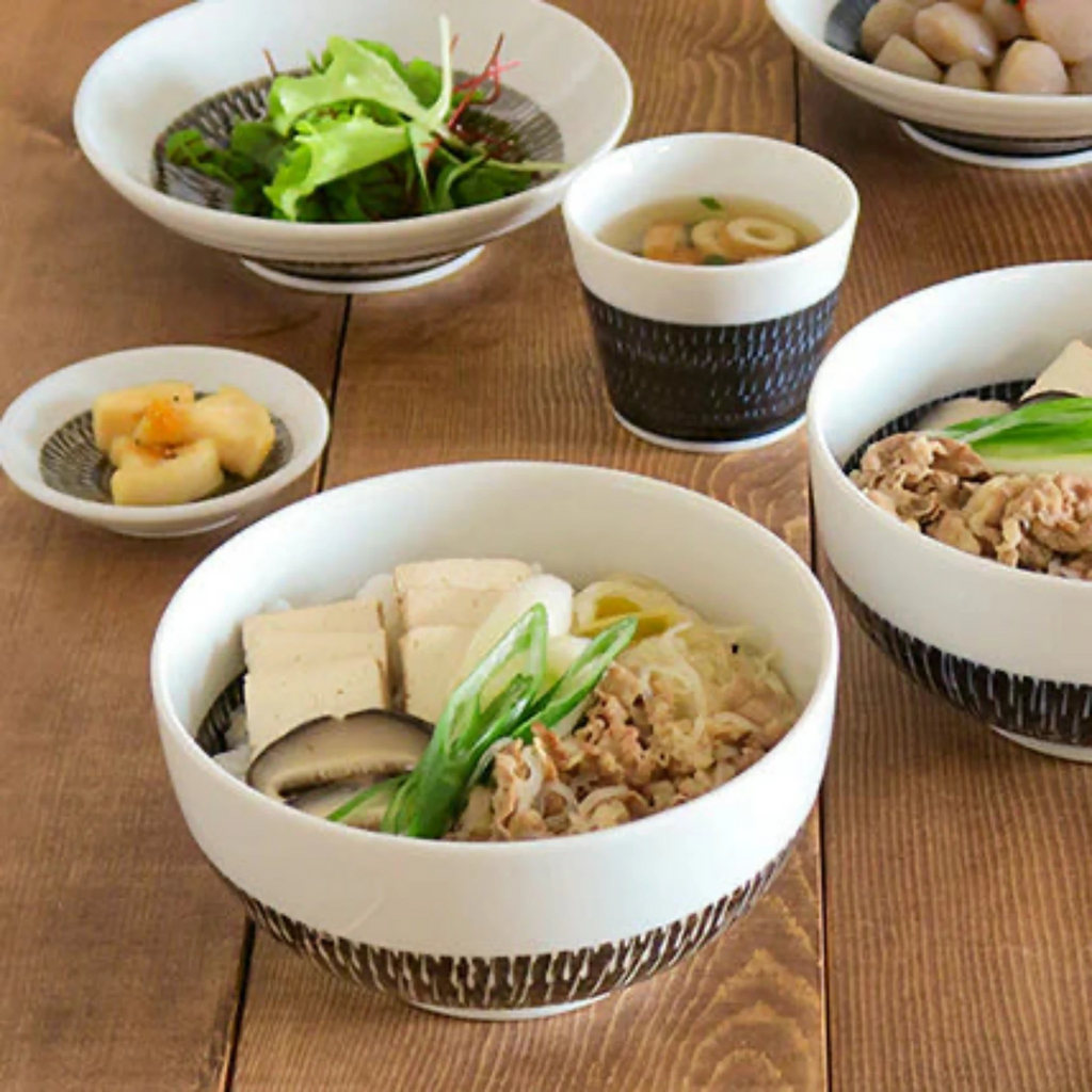 Tobikanna Indigo Blue Series. This cup is traditionally used as a soba dipping bowl but it can also be used for any type of dipping sauce, side dressing, snacks, candy, spices or even as a teacup. Mix and match with other coordinating soba cups.