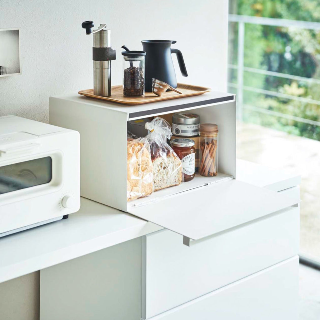 Keep your baked goods fresh with our elegant bread boxes. Available in two variations, they reduce countertop clutter and enhance kitchen decor.