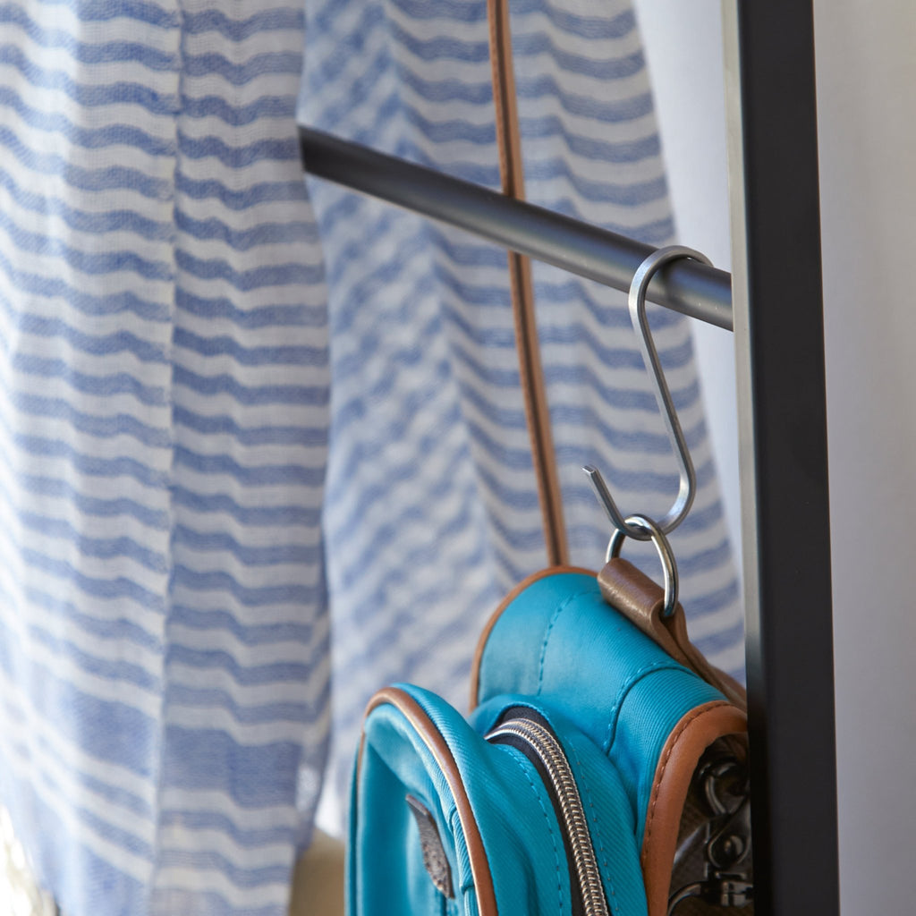 Use each of the rungs to hang clothing, accessories, and bedding. Thinking about hanging items instead of draping them? Toss on a few simple s-hooks and hang to your heart's content.