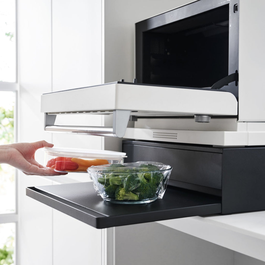 The vanishing pull-out shelf also provides ample space to perch a mug while you perfect your morning beverage or rest that bowl of leftovers you just microwaved so you can season it up before carrying it to the table. 