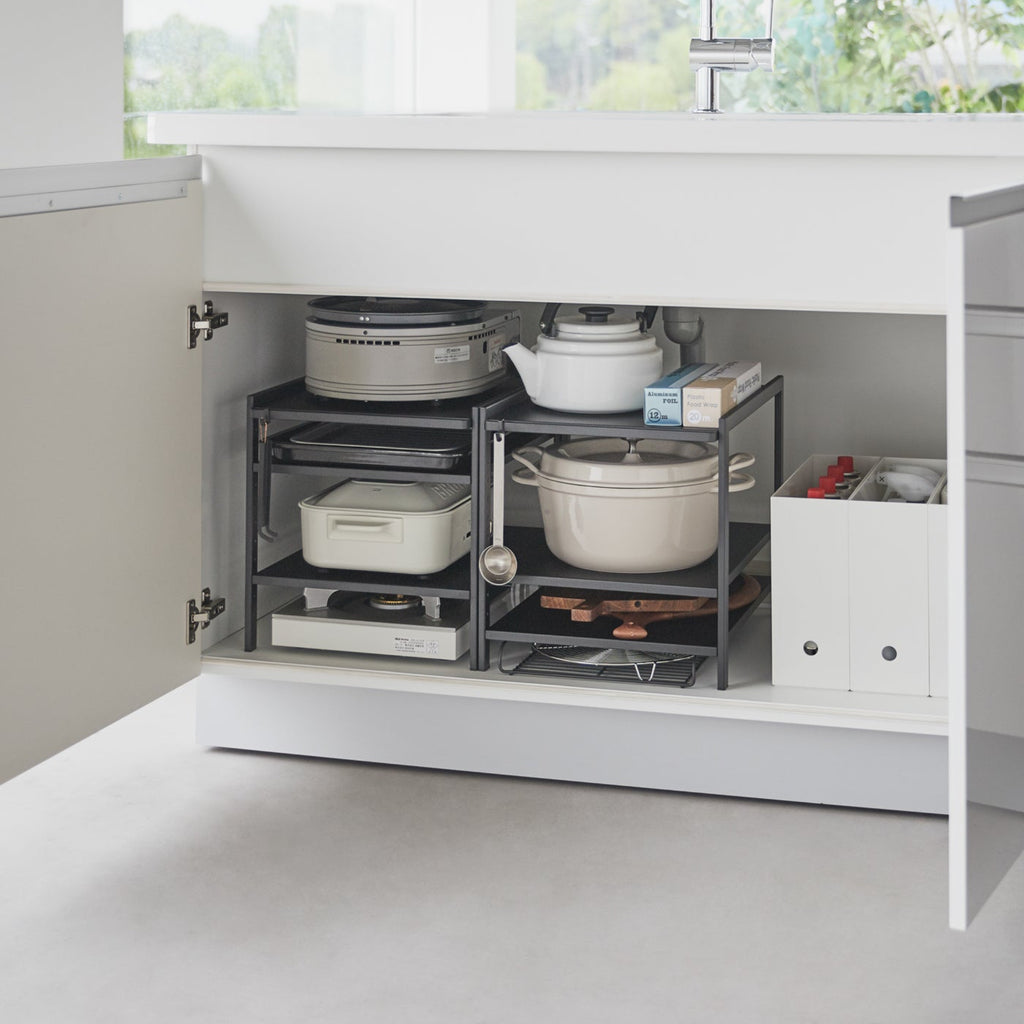 Make the most of vertical storage space. This 3 tier kitchen storage rack is the key to cabinet organization! Make the most of vertical storage space with its adjustable shelves and hooks.
