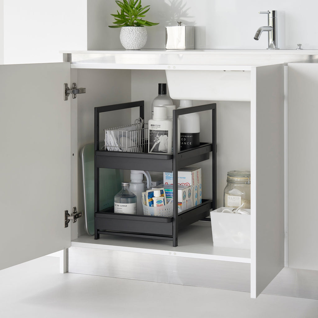 This 2 tier kitchen storage rack is the key to making the most of under-sink storage! Put everything within reach with this rack's pull-out shelves.