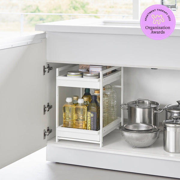 This 2 tier kitchen storage rack is the key to making the most of under-sink storage! Put everything within reach with this rack's pull-out shelves. Awarded "Best Under-Sink Organizer" by the 2025 Apartment Therapy Organization Awards.