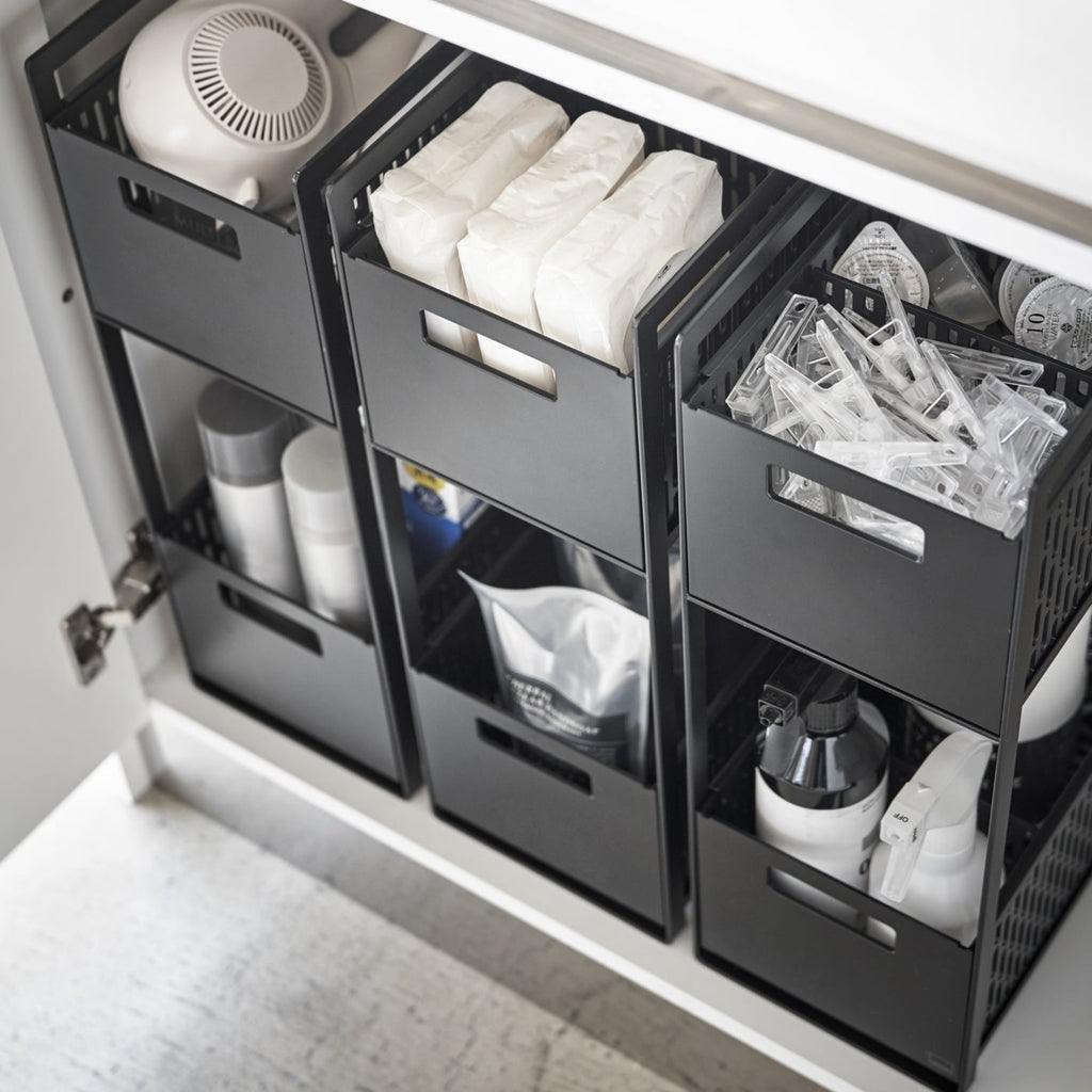 Reinvent cabinet storage with this two-tier solution, designed to revive any dead vertical space! These racks are fully modular with dividing walls to customize the storage compartments on each level. From toiletries to cleaning items, make full use of your space and enjoy the convenience of the pull-out drawers. The bins are designed to ventilate, so you can even use them in the pantry to keep staple vegetables in stock!