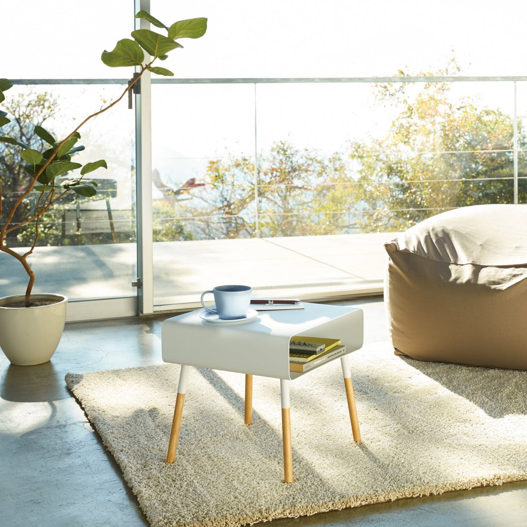 Use this end table in cozy corners, living rooms, or bedrooms. The shorter height, at 14-inches, is shorter than standard side tables, which average 22-30 inches. Pair with lower furniture. Fits perfectly with couches, beds, and chairs throughout the house.