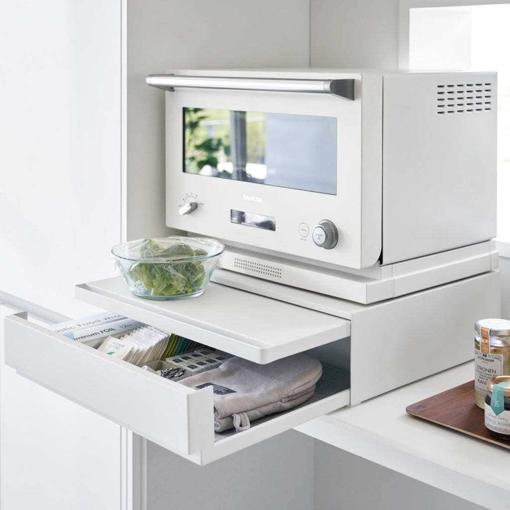 The vanishing pull-out shelf also provides ample space to perch a mug while you perfect your morning beverage or rest that bowl of leftovers you just microwaved so you can season it up before carrying it to the table. 