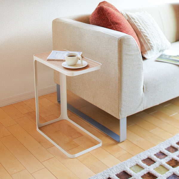 Yamazaki Home Frame C Side Table makes it perfect for snuggling over a sofa or futon couch. Cuddle up with a fresh brew and a good book or break out the laptop for some comfy work from home vibes.