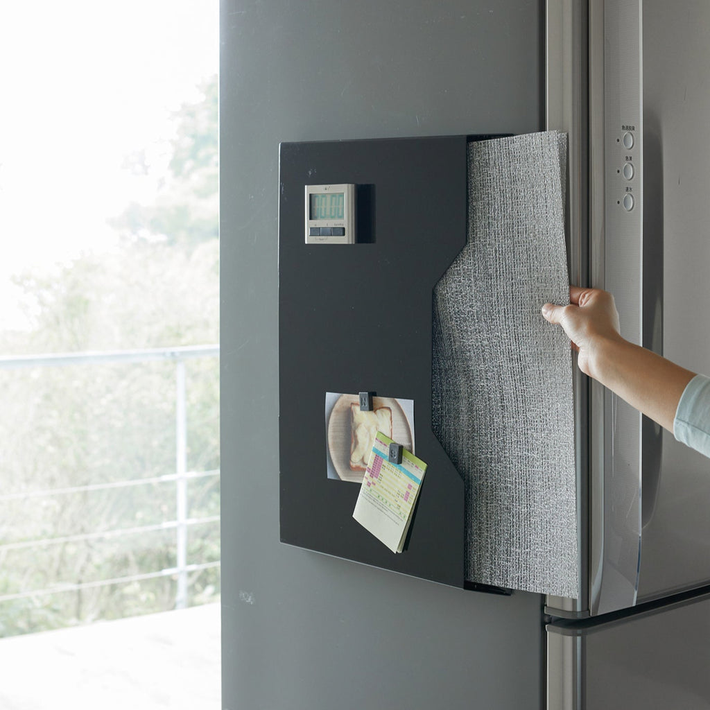 It’s slim and magnetic, perfect for attaching to the inside of a cabinet drawer or the side of a fridge so your mats are clean and dinner-ready. 