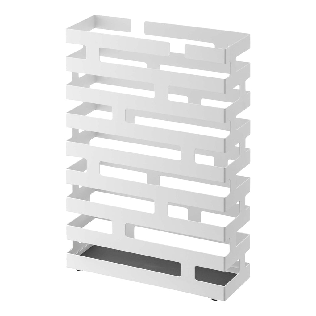Yamazaki Home Brick Rectangle Umbrella Stand in white. SKU 2360. Holds 8 umbrellas. The main body of the stand is made out of steel and rust resistant.