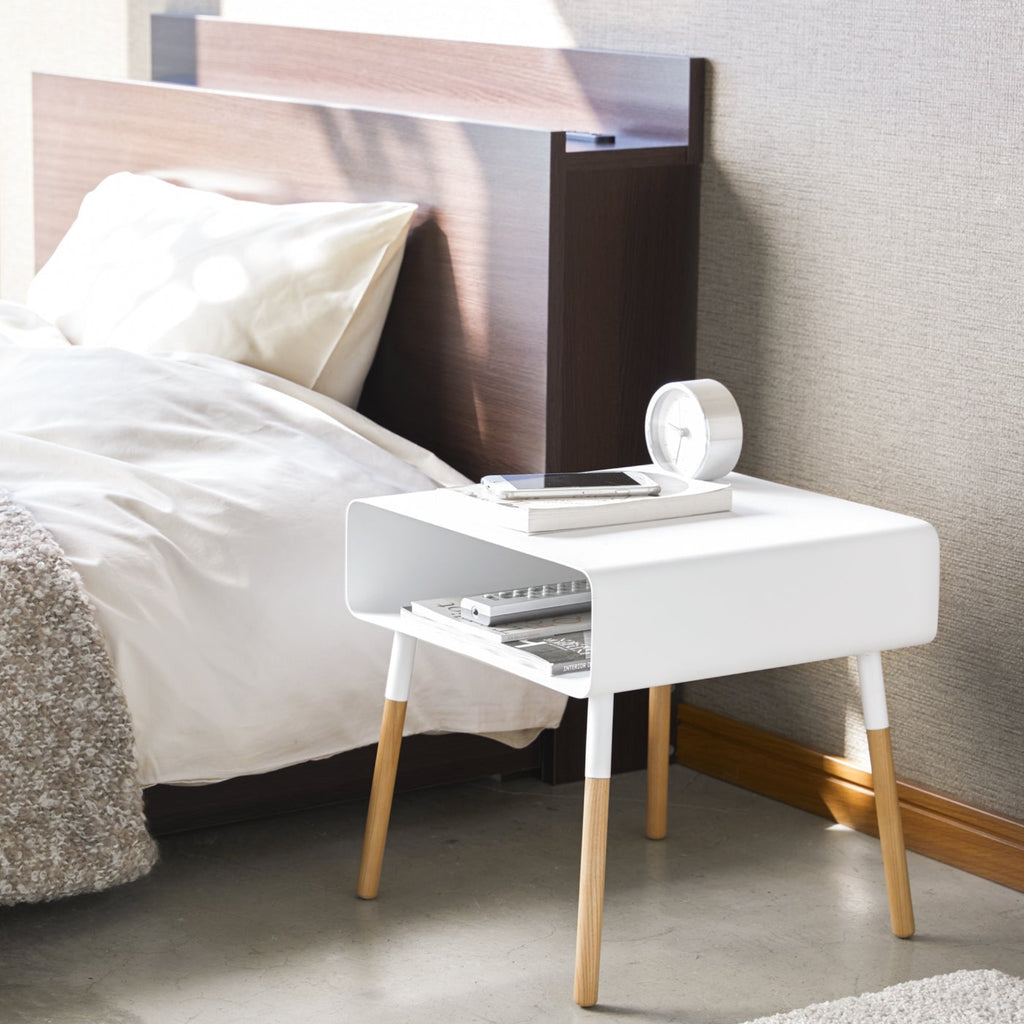 The 14-inch version was designed to pair with lower bed frames, providing extra surface area and a storage shelf for your end-of-day essentials. Thanks to its low frame, this storage table would also make the perfect end table for a child’s room. Pack their favorite bedtime stories into the storage shelf to keep handy and a plush toy on top to perfect the look.