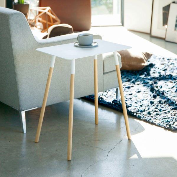 A simple and sturdy side table that will snuggle up to your couch or bed. Whether you’re cozying up with a coffee and a book or looking for a stylish way to display your plentiful plants, this table will be your new best friend. Artful and modern, it looks good in almost any room.