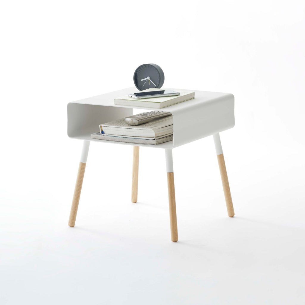 Keep bedtime reads and snooze buttons within reach! The perfect side table to elevate bedroom or living room decor. Please note that the 14-inch version is shorter than most standard side tables. Assembly requires screwing in four wooden legs. No tools required. The product features wood components, made of Ash or Walnut. Some variation in wood grain and color is expected.