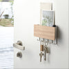 Hang keys, masks, and more on the hooks, and keep mail and essentials in the upper compartment. 