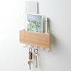 Elevate your entryway with the stylish Yamazaki Home Rin Steel Wood Magnetic Key Rack. 