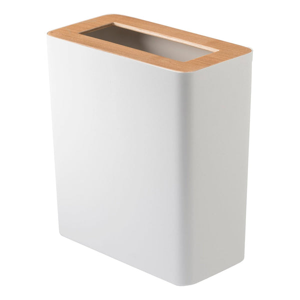 Is your home riddled with ugly plastic trash cans? Bin them and try these classy and modern waste baskets. The wooden lid adds a charming accent while also secretly hiding the waste within! An inner ring holds a bin liner in place discreetly and invisibly. Smart and stylish. Designed in Japan. Made in China.