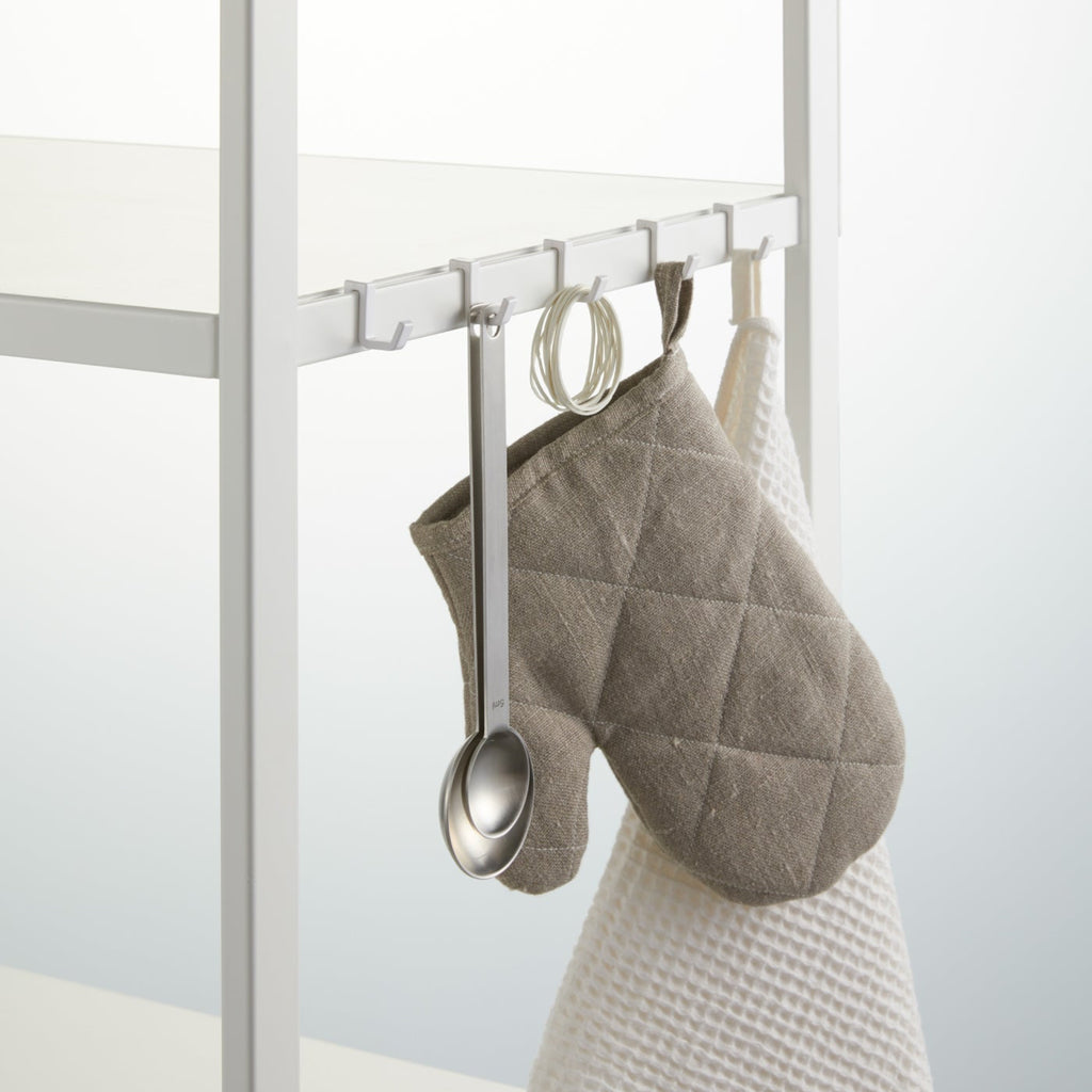Use provided hooks to hang everyday kitchen tools. Three shelves can be installed in five locations (pre-drilled holes provide options). The shelves can hold 17.6 lbs each, hanger bar 6.6 lbs, and hooks 1.1 lbs each.