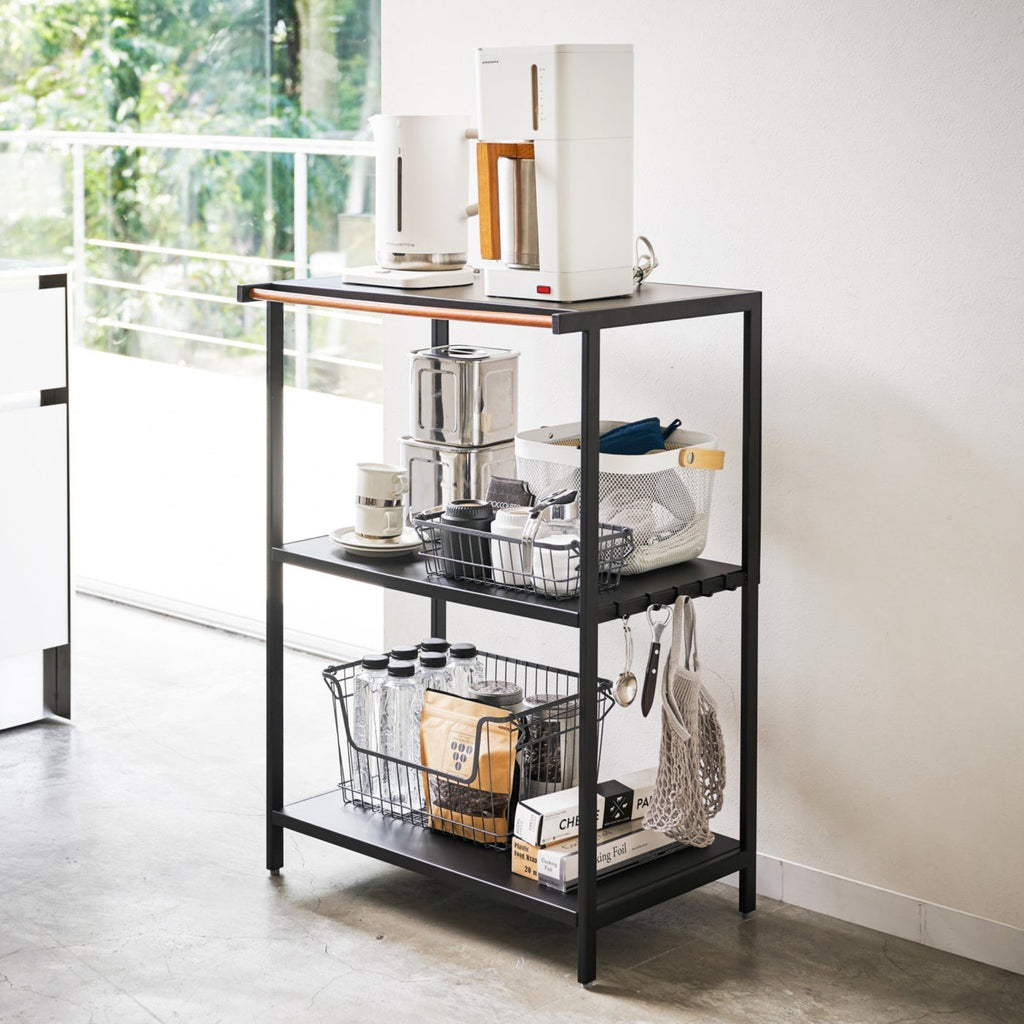 This 3-tiered organizer creates additional storage space easily in the kitchen for mid-sized appliances such as toaster ovens, microwaves, and blenders, keeping your counters and floors organized.