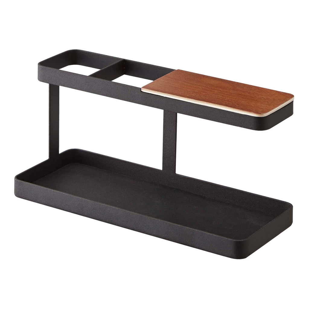 Yamazaki Home Tower Desk Organizer Black Steel SKU 2300. Yamazaki Home Tower Desk Organizer creates a designated spot for items always floating around your desk or dresser. This simple organizer has a base tray for housing odds and ends. 