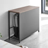 Part of the sleekness of this solution is a stylish front panel that hides the contents, while still allowing easy access from the side. 