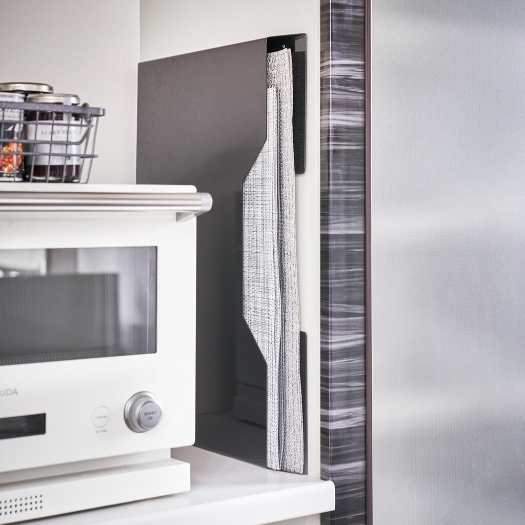 If you have no suitable place to put them, try this placemat holder. It’s slim and magnetic, perfect for attaching to the inside of a cabinet drawer or the side of a fridge so your mats are clean and dinner-ready.