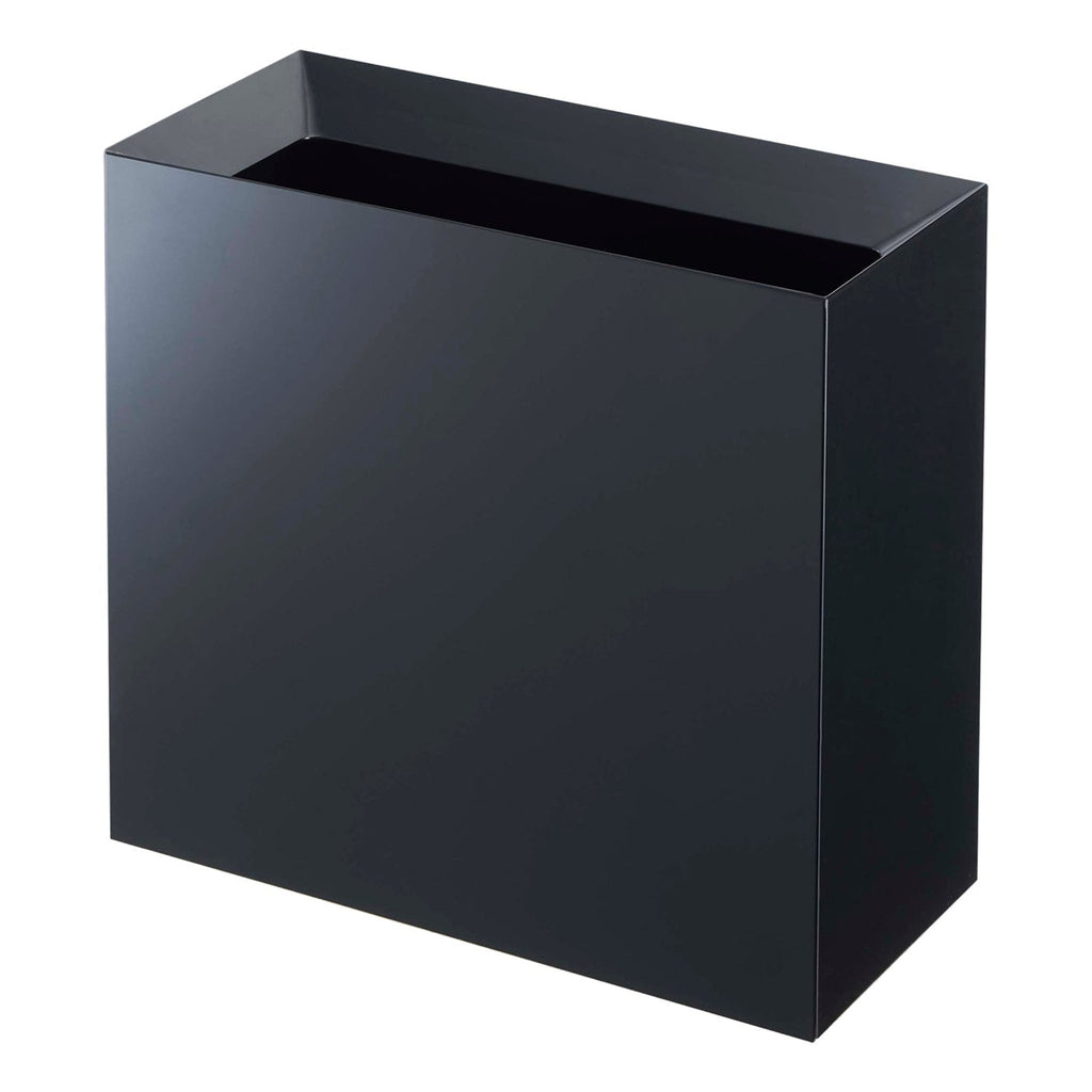 Yamazaki Home Tower Trash Cans offer much more than meets the eye. The slanted opening was integrated to hide unsightly trash within. An interlocking design pins your trash bag in place while simultaneously hiding the unattractive bin liner. Lastly, a handle at the back makes for easy emptying. 