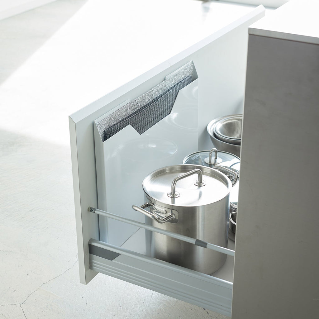 It’s slim and magnetic, perfect for attaching to the inside of a cabinet drawer or the side of a fridge so your mats are clean and dinner-ready. 