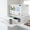 Reclaim the precious countertop space your kitchen appliances are hogging with this unique two-way drawer.