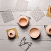 A perfect gift for the new homeowner, cocktail enthusiast, or entertainer in your life, our coasters come in sets of four. Pair with a bottle of wine, or set of modern-twist placemats! Our eco-friendly coasters are easy to clean and dishwasher-safe.