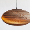Handcrafted from recycled cardboard, Graypants flagship Scraplights provide warm, intimate, and functional lighting for any occasion or space. Tough and elegant, each is precision cut with a laser and assembled by hand using non-toxic adhesive, and all Scraplights are treated with a non-toxic fire retardant.