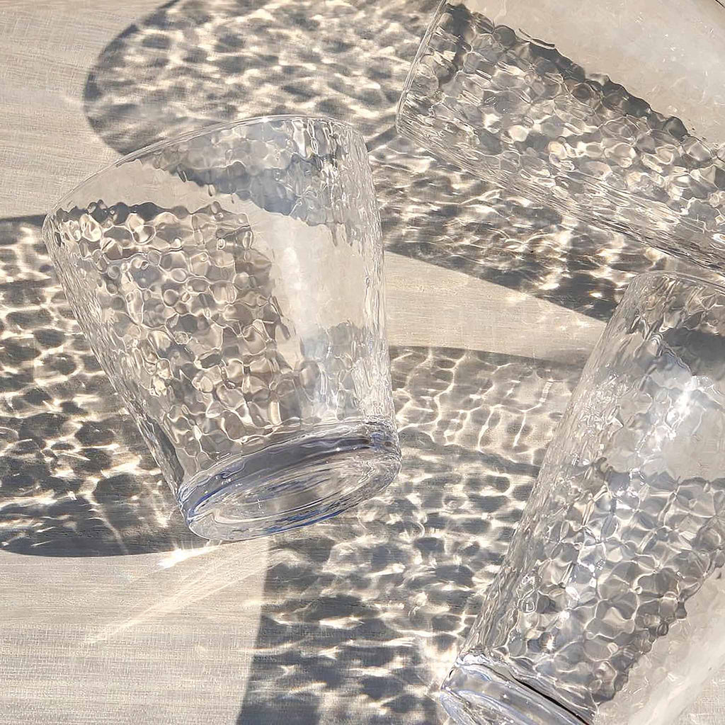 Uniquely textured Toyo-Sasaki Glass Sazameki Tumbler is inspired by the nature of gentle ripples created in the breeze. The transparency and shine of the glass combine with durability to enhance the taste of your drink. 