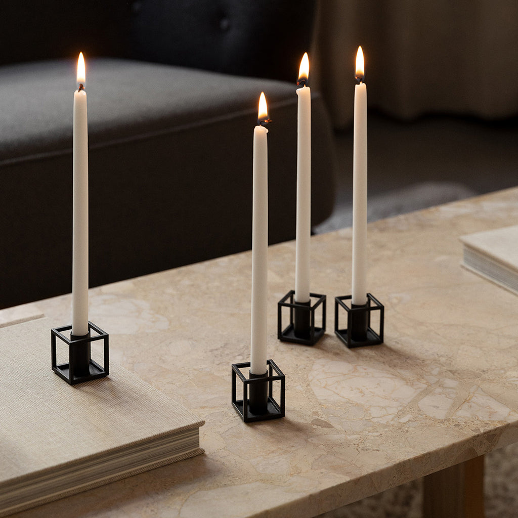 With a sharp sense of contemporary Functionalist style, Mogens Lassen designed the iconic Kubus candleholder in 1962, a piece once reserved solely for family and close architect colleagues. The Kubus is still crafted in Denmark, and among architects and design connoisseurs it has acheived the status of a modern international design icon. 