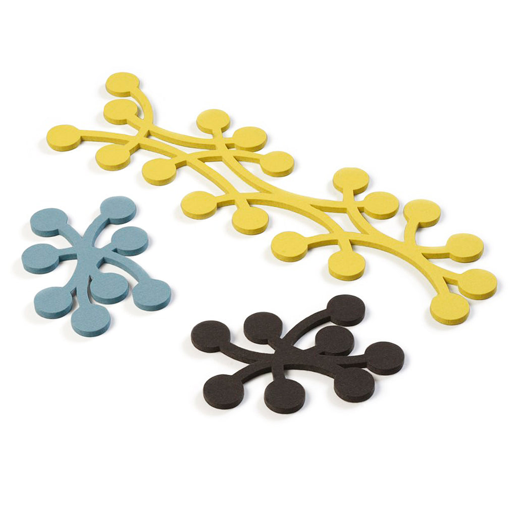 Designer Tuttu Sillanpää got her inspiration from a bunch of cherries when designing the MARJA Trivet. 403-UM2-10. 403-UM1-01